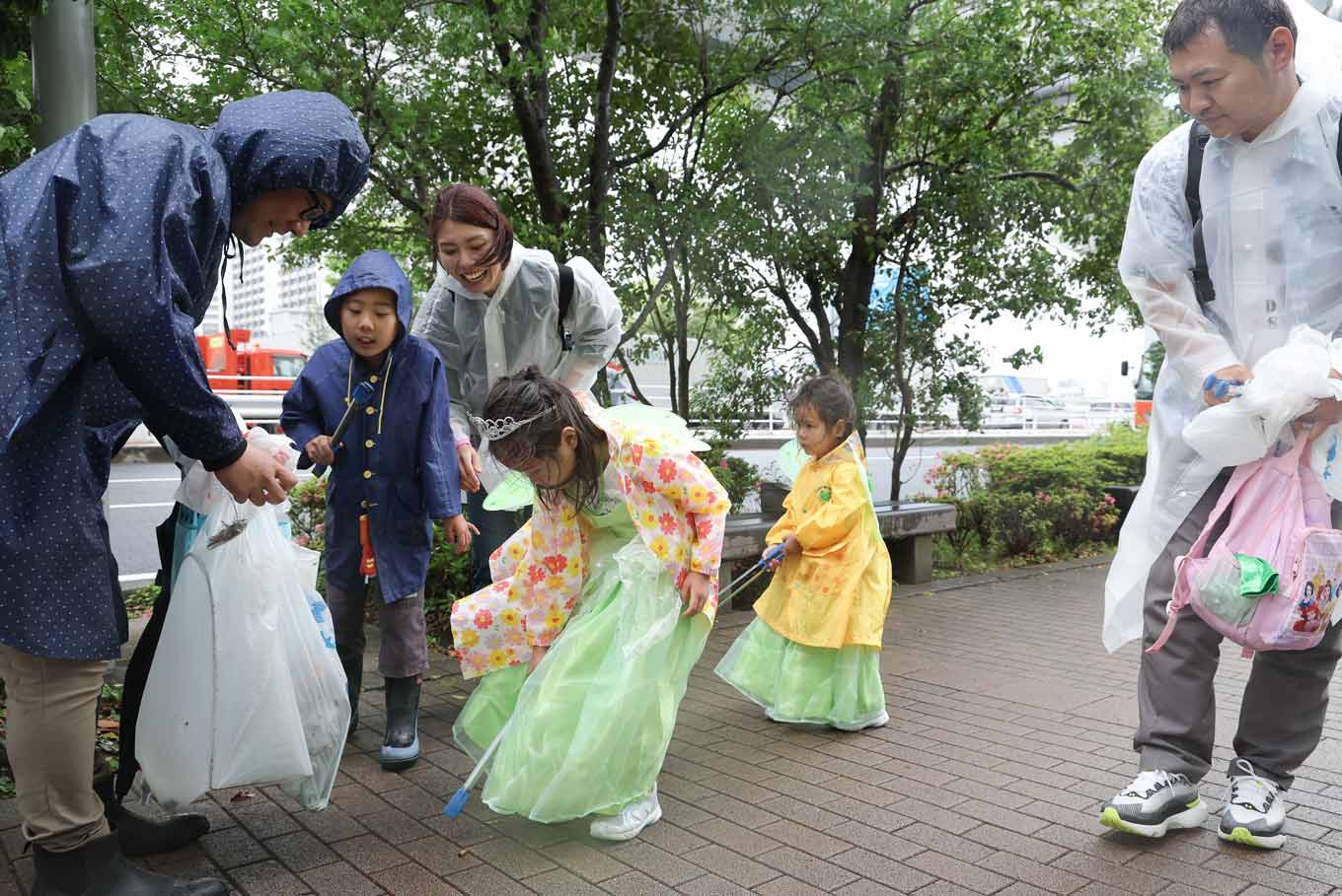 Photo of children picking up trash