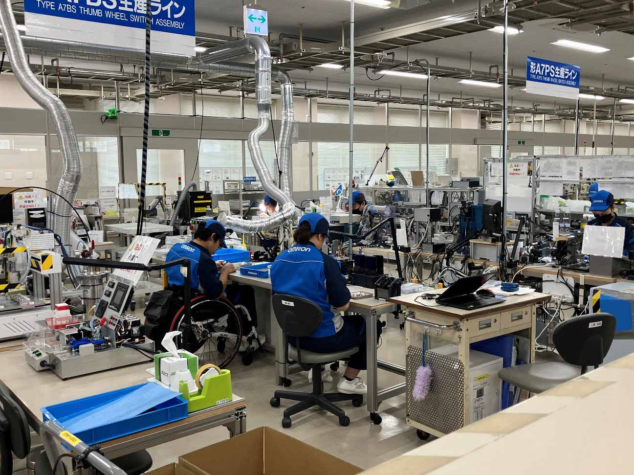 Photo of workers on the Omron Taiyo factory floor