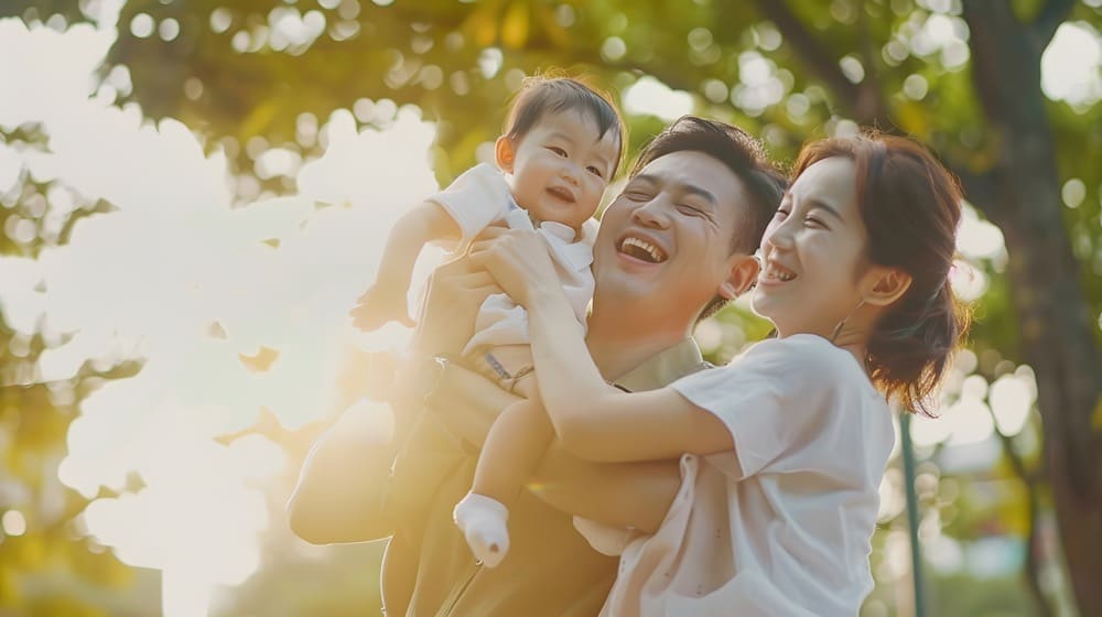 A couple holding a child