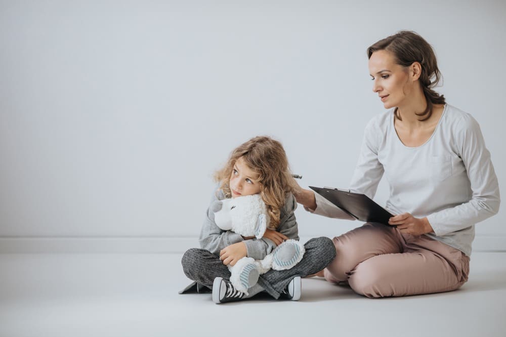 An adult comforting a child