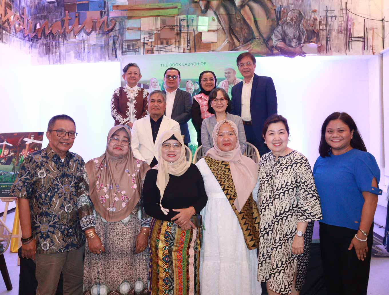 Photo: CARD representatives, Sharia advisers, and members of the Muslim community take part in the launch of the CARD Paglambo Book.