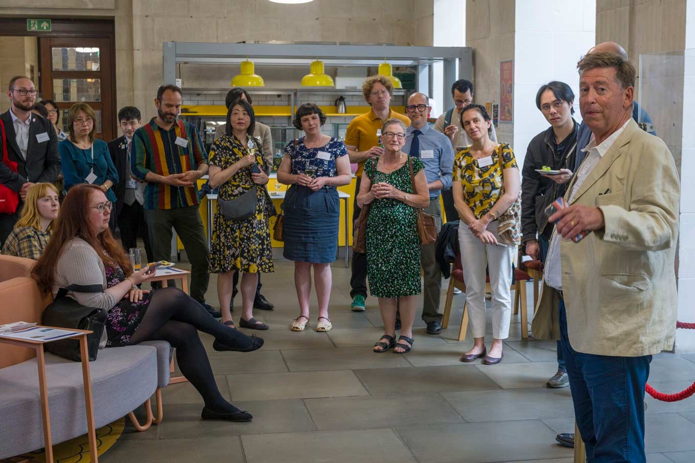 Photo of Paul Madden speaking to attendees at the reception