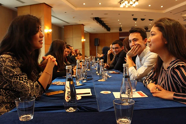 Photo of students engaged in conversation