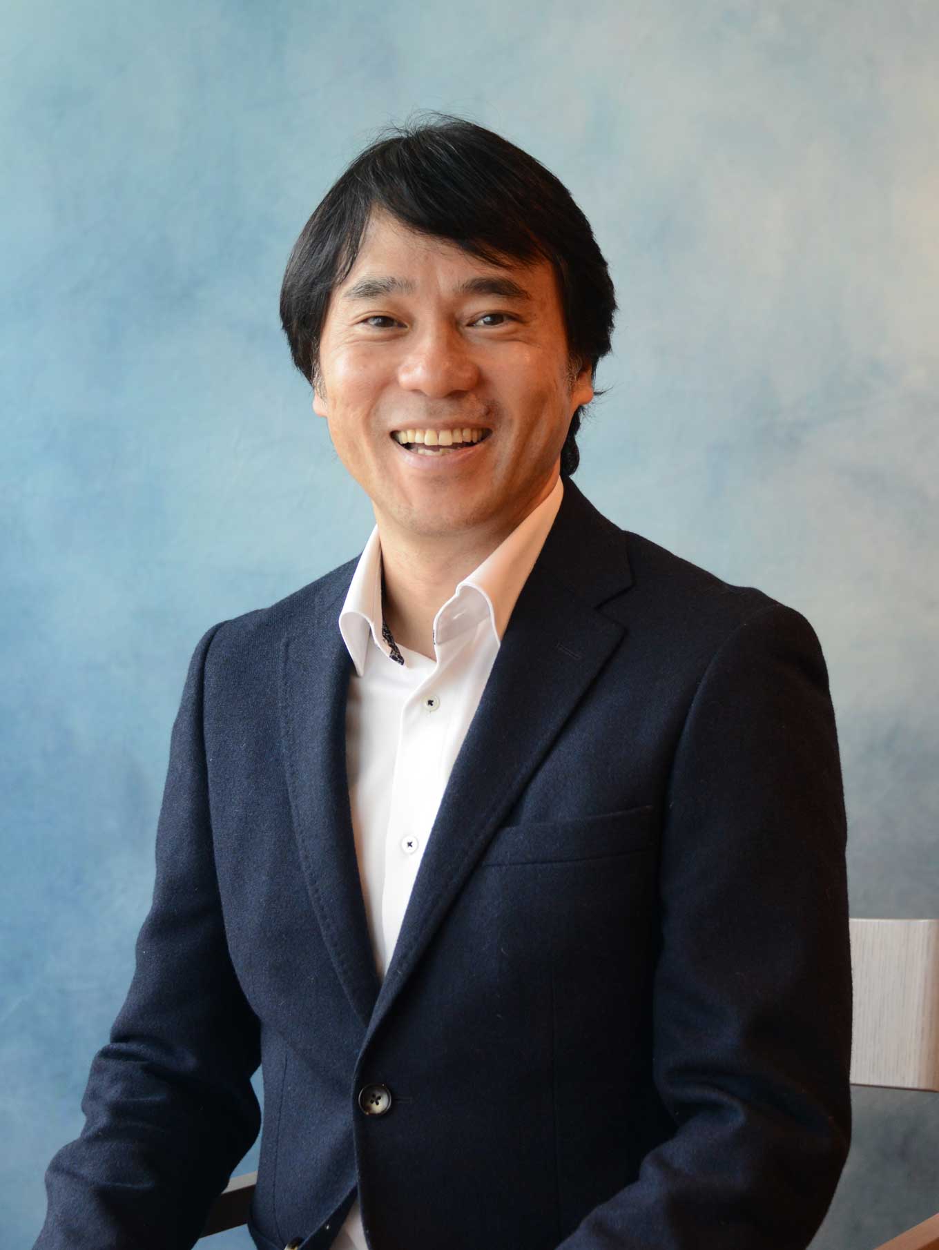 Photo: Portrait of Takashi Arikawa