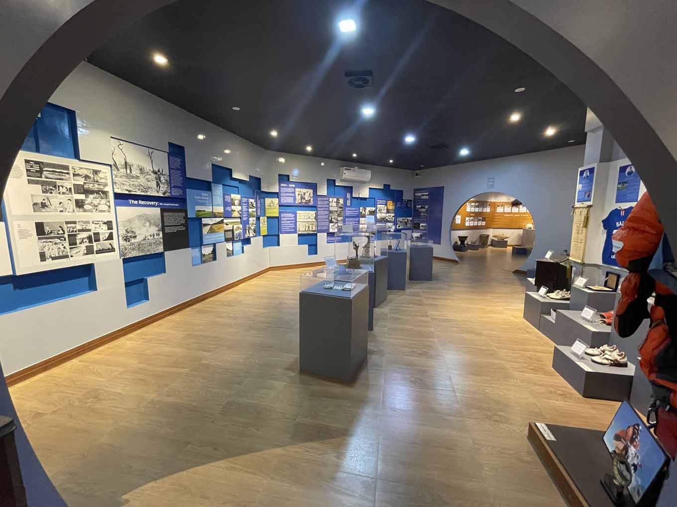Photo of the museum’s postwar section, with interpretive panels and display cases