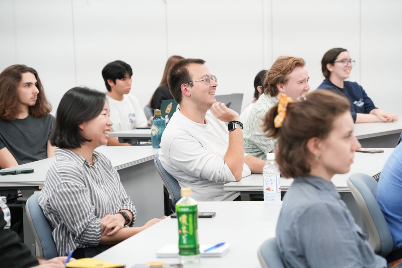 Photo of students seated at desks in a classroom